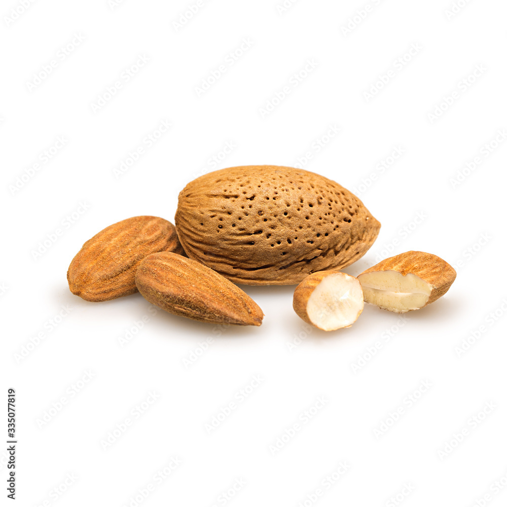 almonds in their skins and peeled with leaf isolated on white background almonds in their skins and peeled with leaf isolated on white background