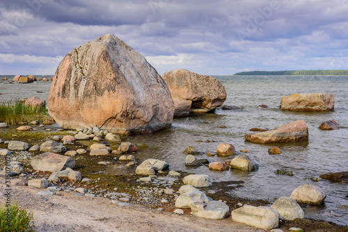 Picturesque Baltic sea coast with boulders, Kasmu village, Lahemaa national Park, Estonia photo