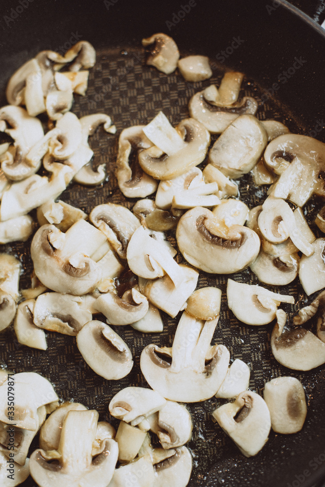 Freid mushrooms cooking on pan Freid mushrooms cooking on pan