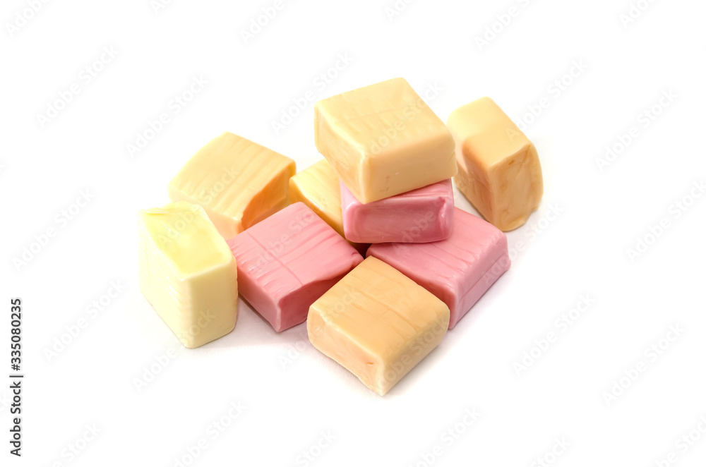 colored chewing sweets on a white background. colored chewing sweets on a white background.