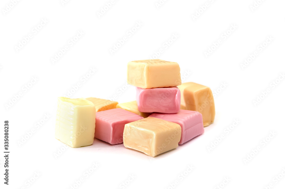 colored chewing sweets on a white background. colored chewing sweets on a white background.
