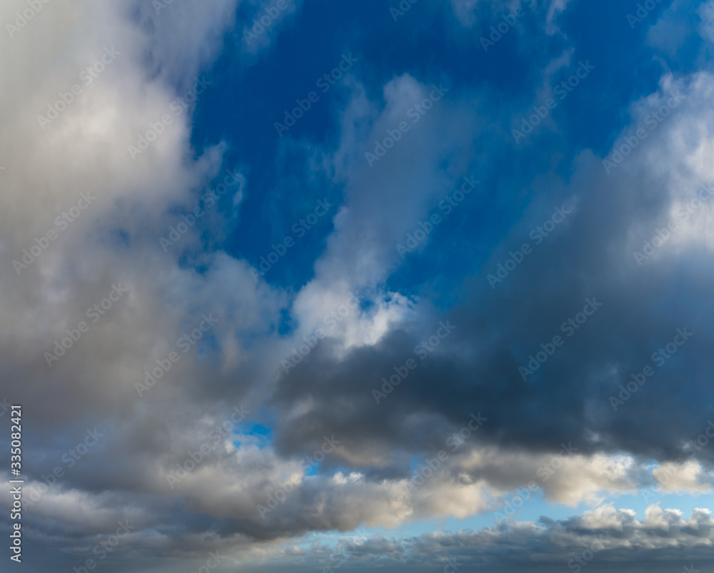 Fototapeta premium Fantastic clouds against blue sky, panorama
