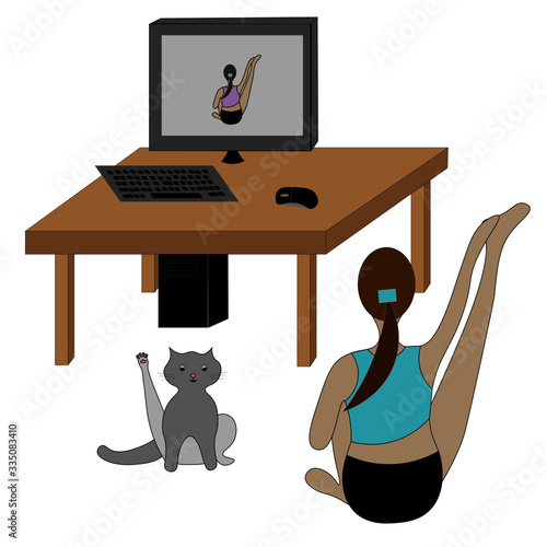 Woman is doing yoga at home under quarantine. Her cat is studying yoga too. Her trainer is on the computer screen.