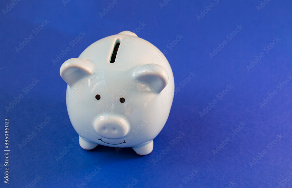 blue pig piggy bank on a blue background blue pig piggy bank on a blue background