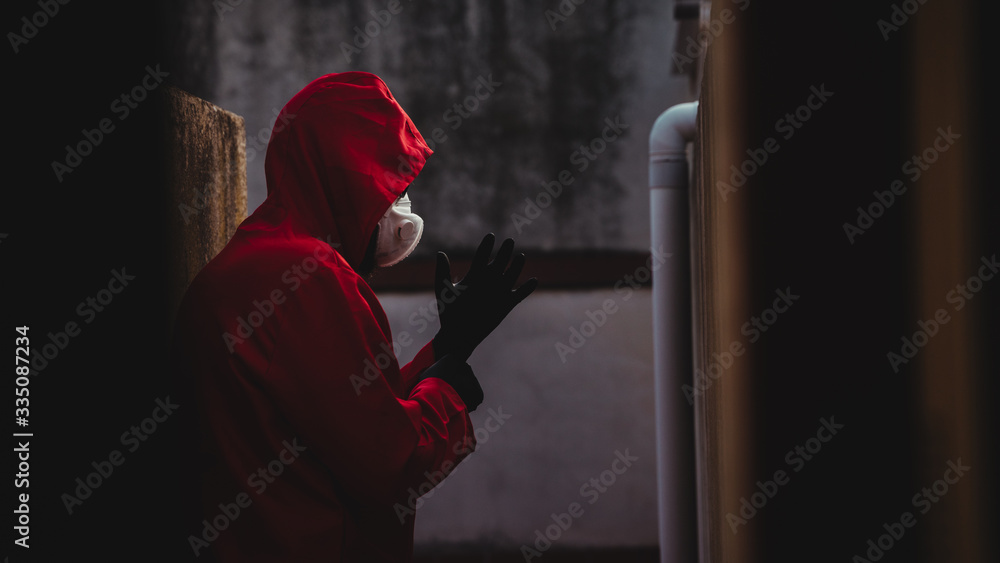 Money Heist character is dressed in new clothes, protected by the new covid19 virus, mask and gloves