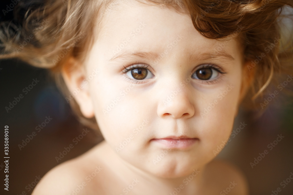 Portrait of very sweet little child baby or girl toddler. Close up Portrait of very sweet little child baby or girl toddler. Close up