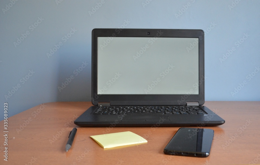 Home office desk with computer cellphone Home office desk with computer cellphone