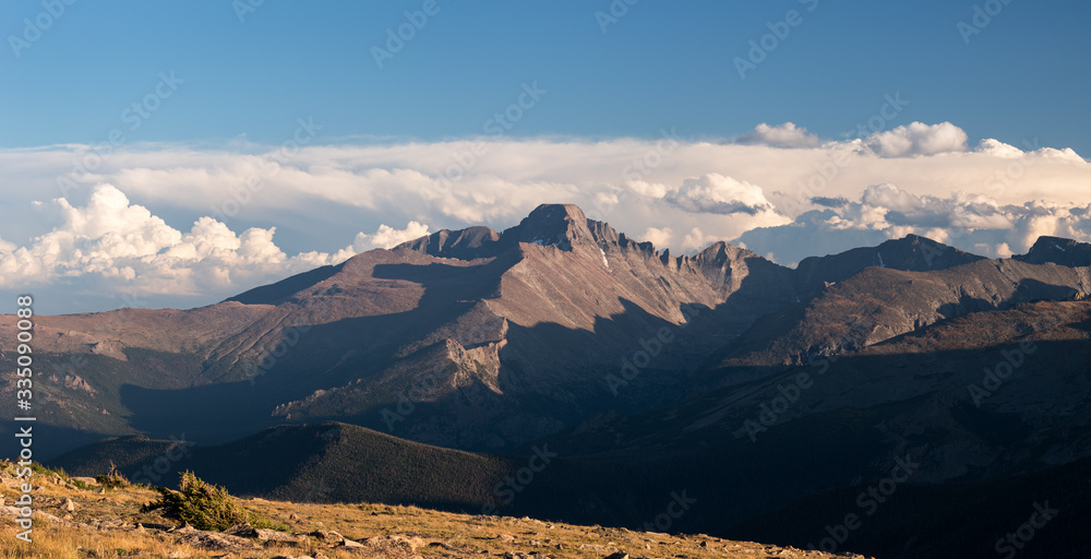 Trail Ridge view point of Longs Peak in the late afternoon light. 14,259 foot Longs Peak is the highest point in Rocky Mountain National Park in Colorado.
