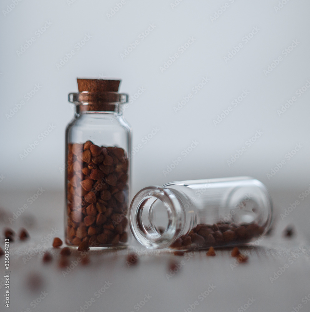 Grain buckwheat in medical flasks and test tube Grain buckwheat in medical flasks and test tube