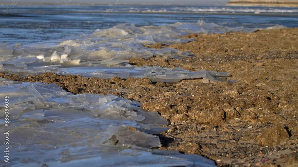 The movement of ice on the shore of the bay. The movement of ice on the shore of the bay.
