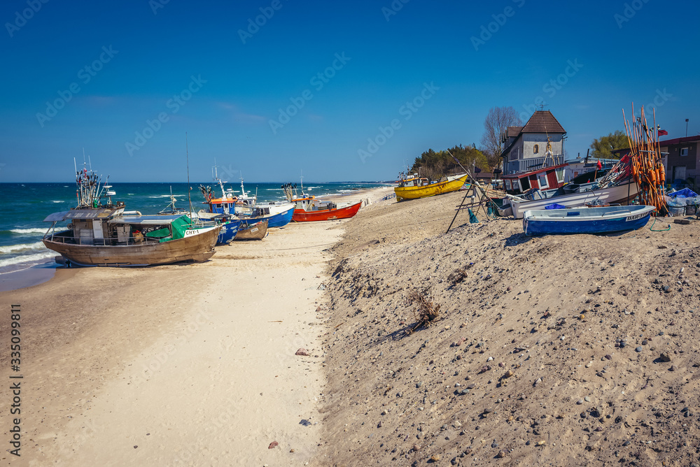Fishing boats on the beach in Chlopy, small village on the Baltic Sea coast, Poland