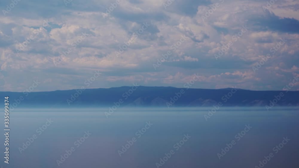 Beautiful view of nature lake baikal. Nature of Russia. Summer vacation. Olkhon Island, Hujir Village, Shamanka Rock. Beautiful view of nature lake baikal. Nature of Russia. Summer vacation. Olkhon Island, Hujir Village, Shamanka Rock.