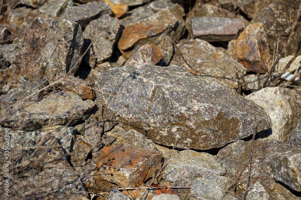 large natural stones piled up in the bright sun