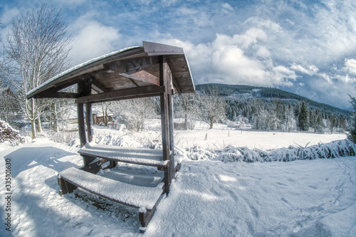 Tourist shed during the winter snow fisheye