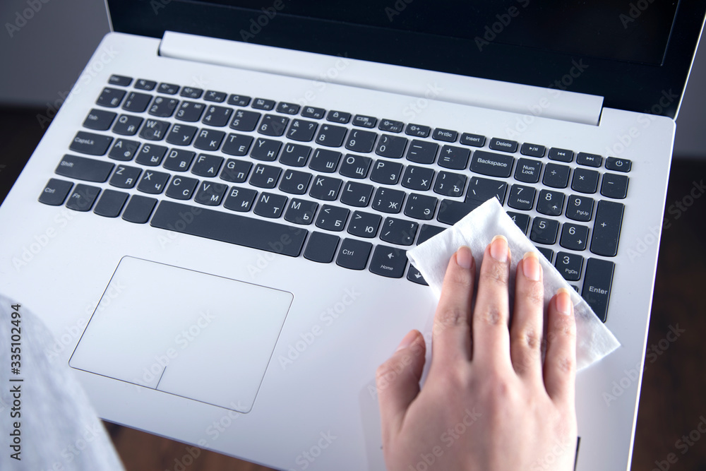 woman hand napkin and computer woman hand napkin and computer