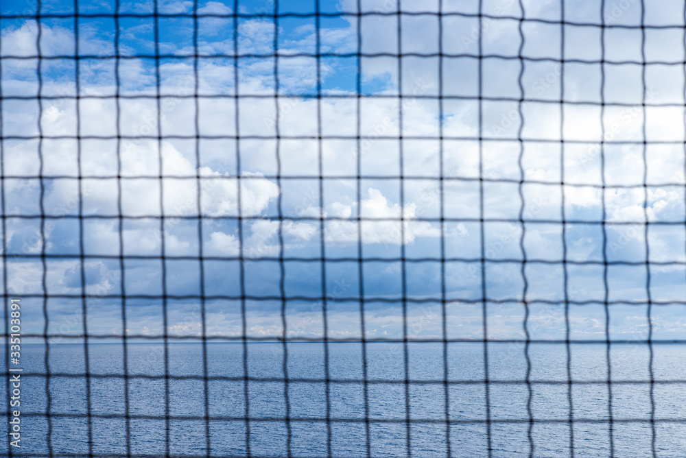 The sky and the sea behind bars The sky and the sea behind bars