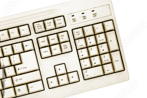 Old computer close-up keyboard numbers panel isolated on white background