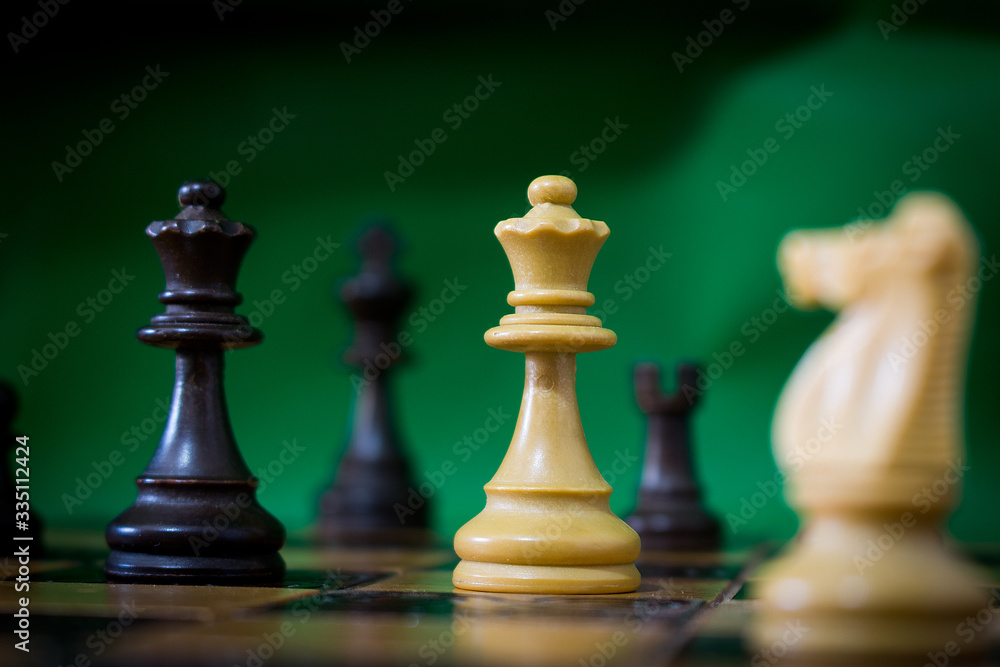 Chess photographed on a chessboard Chess photographed on a chessboard