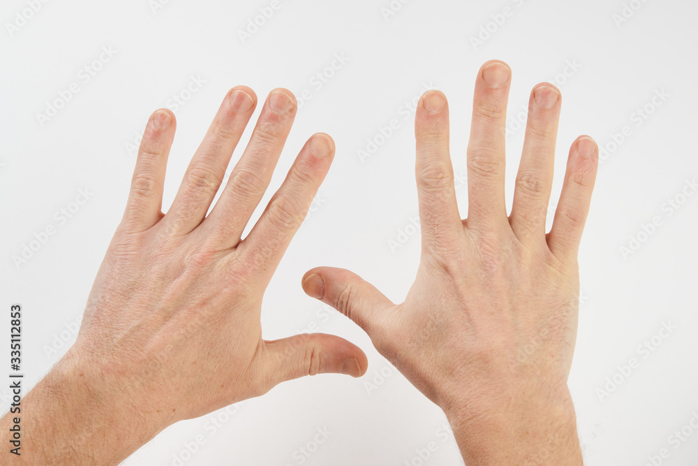 Man's clean hands isolated on white background with copy space.