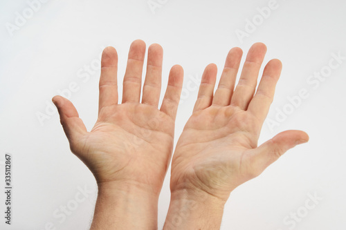 Fotografie Man's clean hands isolated on white background with copy space.