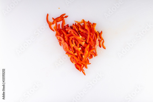 
slicing red bell peppers for cooking in a restaurant4 photo