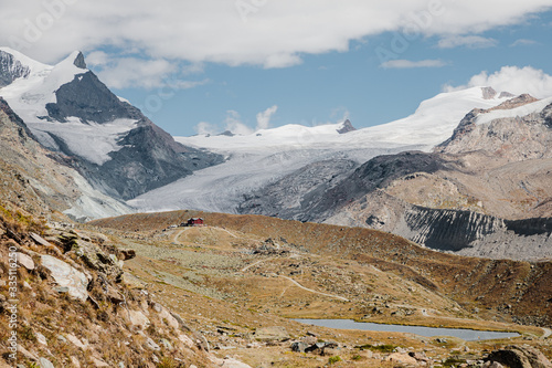 scenic view on Gorner Glacier and mountain peaks of Swiss Alps near Matternhorn