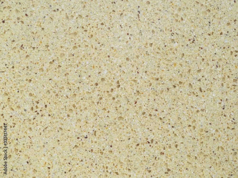 Surface texture of light brown artificial stone.