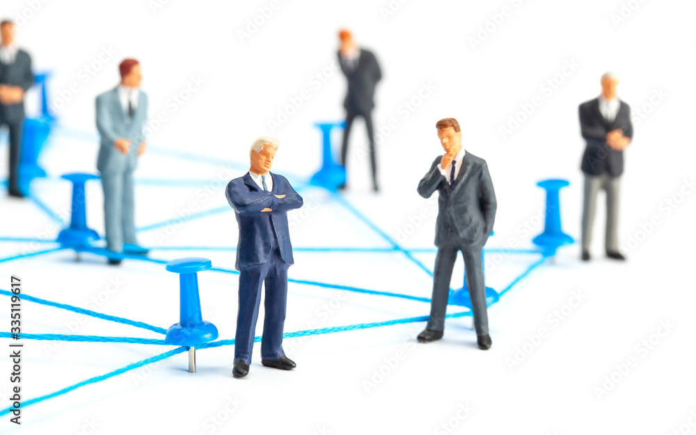 Business connection. Communication between businessmen. Network of threads and office pins. Isolated on white background Business connection. Communication between businessmen. Network of threads and office pins. Isolated on white background
