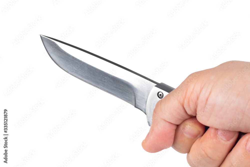 hunting knife in a hand isolated on white background hunting knife in a hand isolated on white background