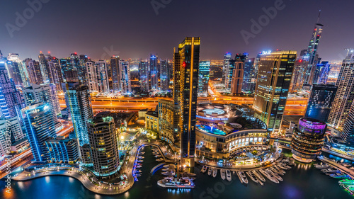 The beauty of skyline at night in Dubai Marina just from the top
