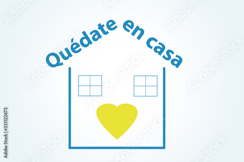 illustration in concept of quarantine with the phrase stay at home in Spanish quedate en casa , due to covid-19 or coronavirus photo