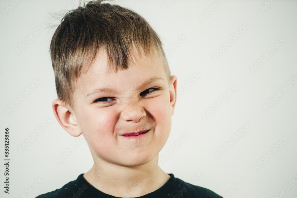 portrait of a dissatisfied or sarcasm child portrait of a dissatisfied or sarcasm child