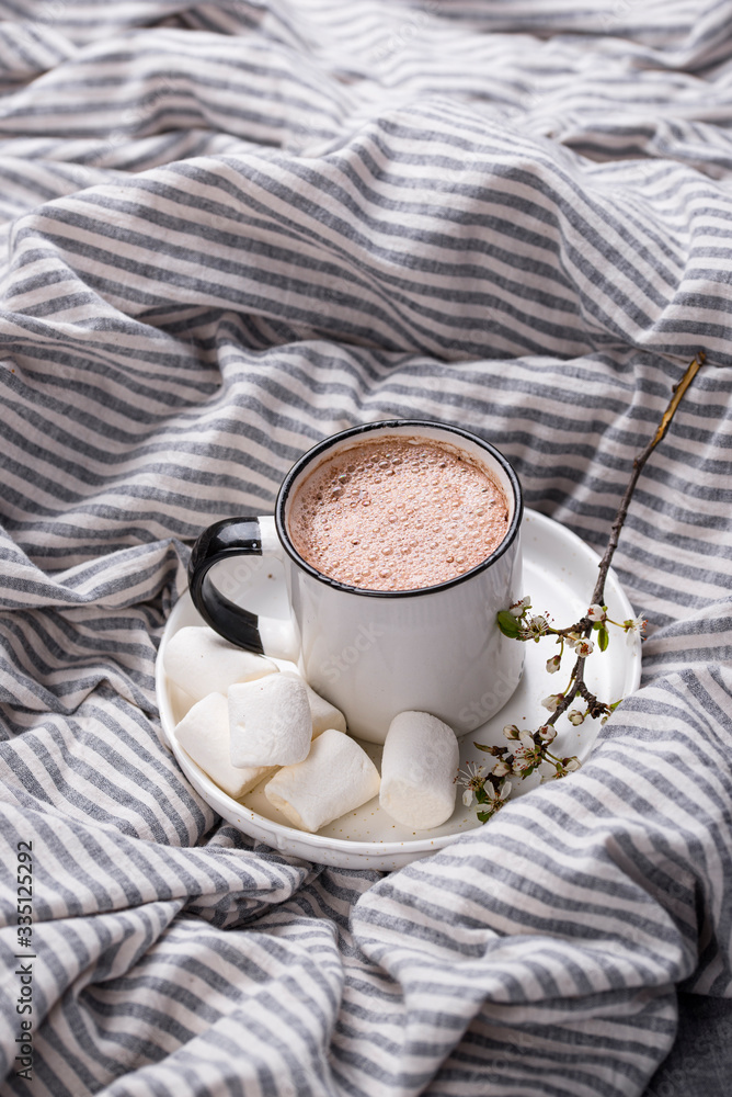 Cup of coffee or cocoa on the bed Cup of coffee or cocoa on the bed