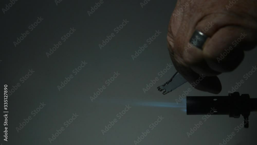 A Beilstein test can reveal halogens in plastic. Copper wire is heated