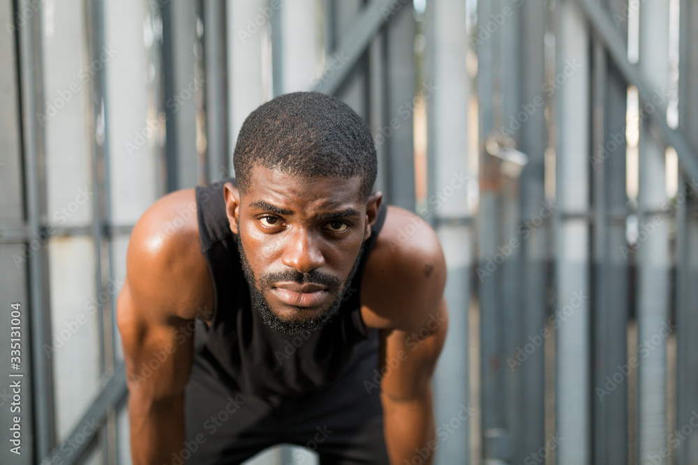 Man looking at the camera during workout Man looking at the camera during workout
