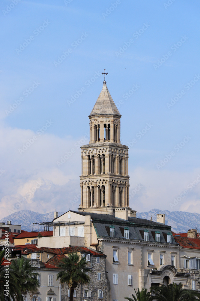Historical tower in the middle of Split named Church of Our Lady of the bell tower. Light in dark. Catholic church. Part of archival city in Croatia. Tower created from pillars