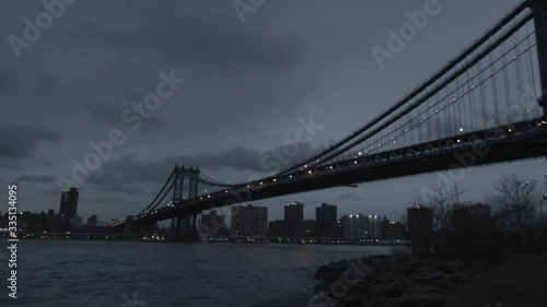 Brooklyn Bridge Manhattan skyline at dusk New York ungraded in HD panning shot photo