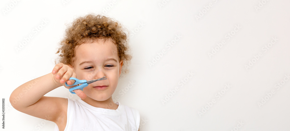 Happy boy in straw hat over white background Happy boy in straw hat over white background