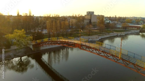 man on the bridge drone sunset video, 4k video