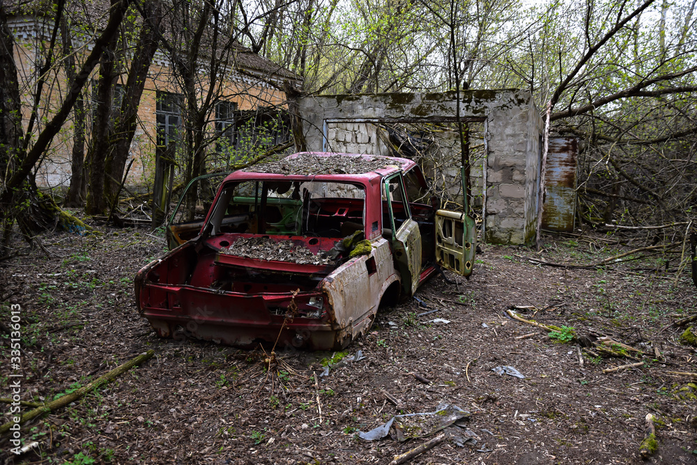 old wreck car located in a forest or ruinlike environment hillbilly old wreck car located in a forest or ruinlike environment hillbilly