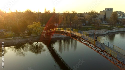 man on the bridge drone sunset video, 4k video