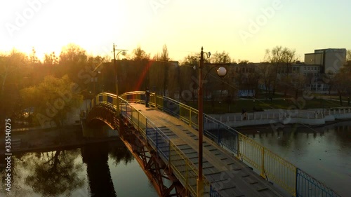 man on the bridge drone sunset video, 4k video