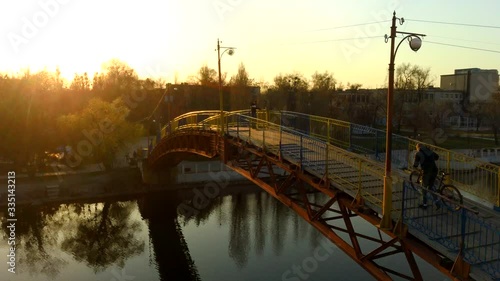 man on the bridge drone sunset video, 4k video
