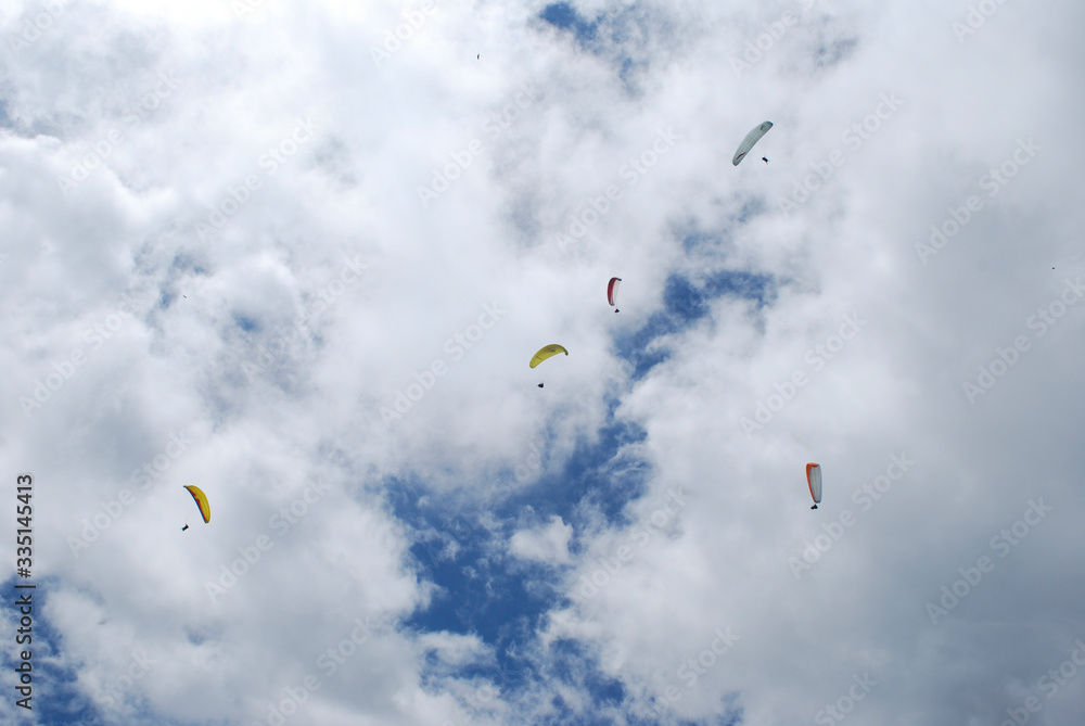 beautiful summer day for paragliding, a great experience beautiful summer day for paragliding, a great experience