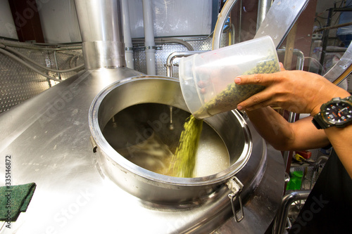 Canvas Print Beer Brewer Adding Hops to Beer Stainless Steel Tank