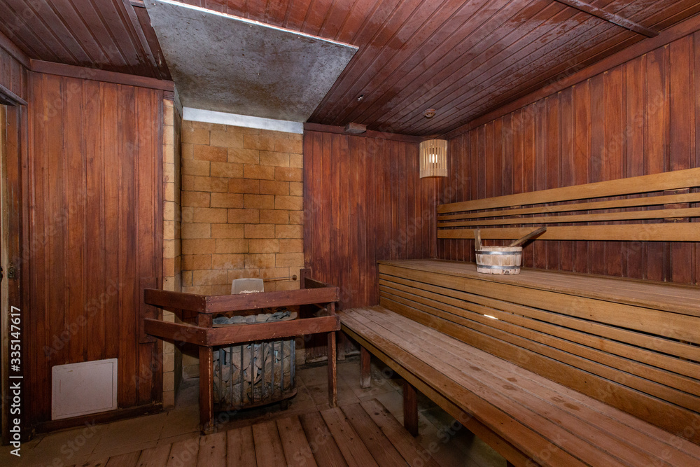 Sauna and sauna accessories on an interior background