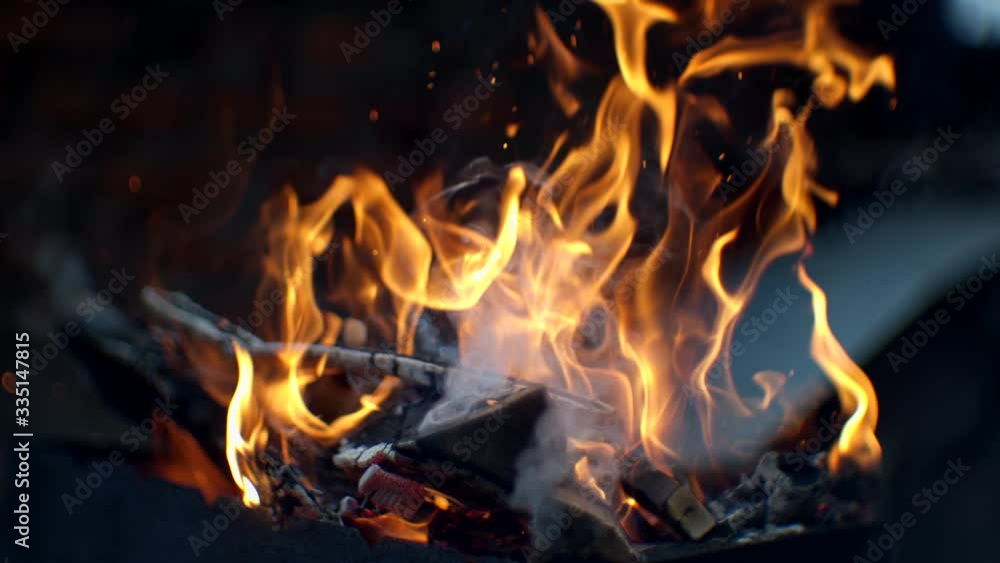 Hot as inferno flame concept, abstract beautiful fire with flakes of spark Hot as inferno flame concept, abstract beautiful fire with flakes of spark