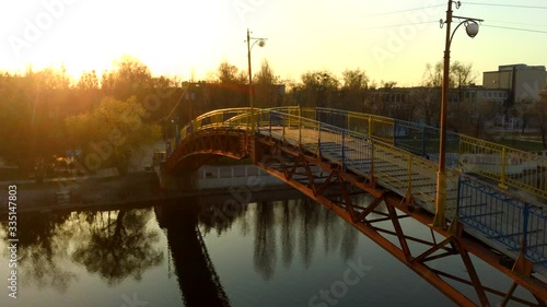 man on the bridge drone sunset video, 4k video