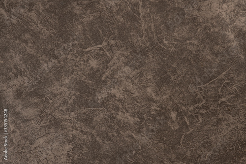 Wall fragment with scratches and cracks