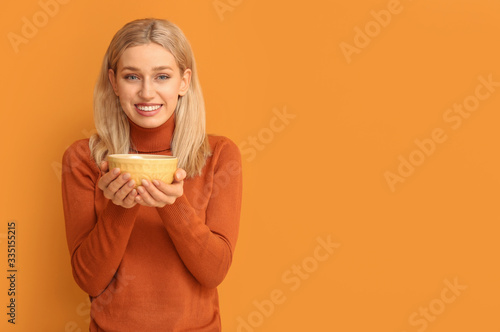 Beautiful young woman with ...
